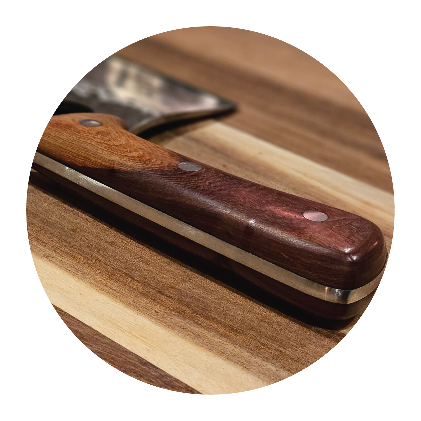 Wooden-handled knife on a wooden surface