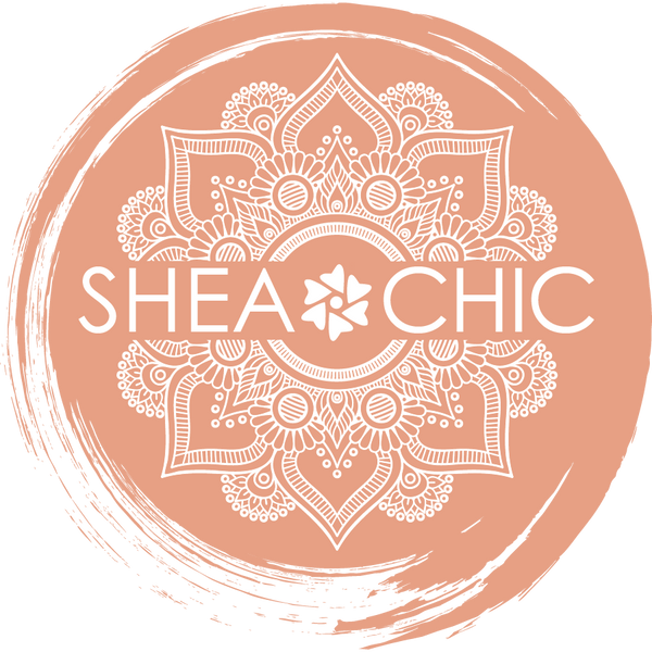 SHEA CHIC logo in white over a swirl of peach color paint