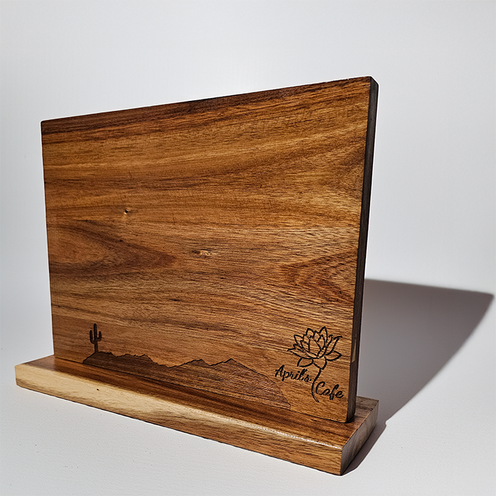 Engraved wooden magnetic knife block on white background