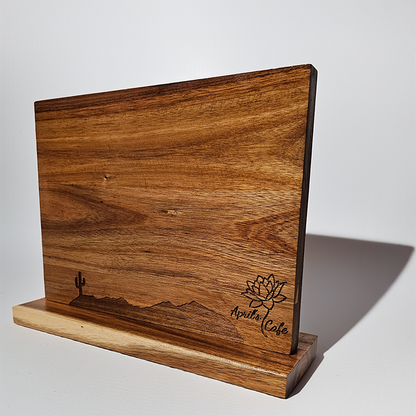 Engraved wooden magnetic knife block on white background