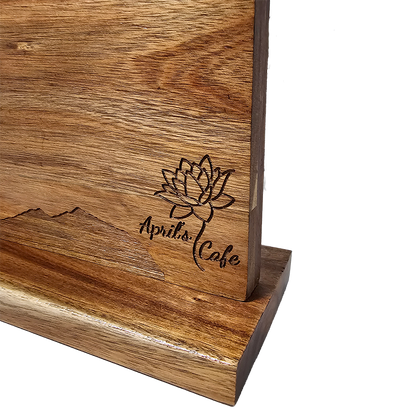 closeup of engraved wooden magnetic knife block
